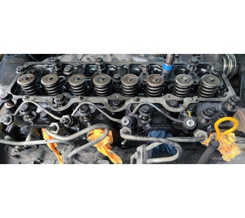 Thay gioăng mặt máy TD27, két nước làm mát TD27 của xe nâng TCM FD25T3 tại nhà máy bao bì Hà Nội